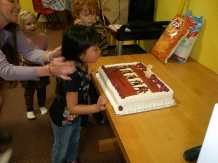 Kasen with Camp Rock birthday cake